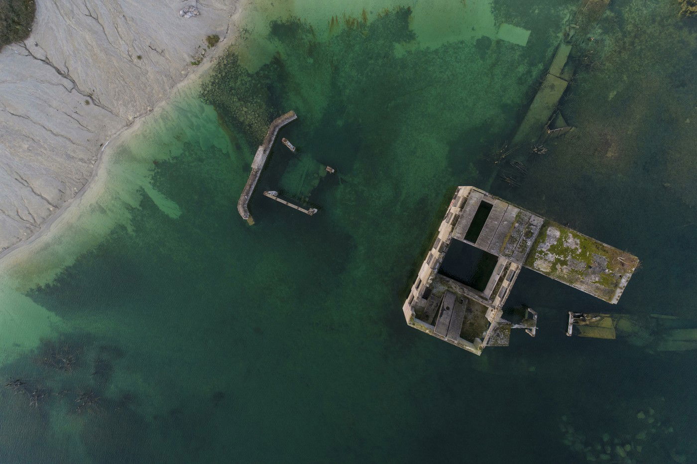 Researchers have discovered more than 40 mysterious circular formations at the bottom of the lake